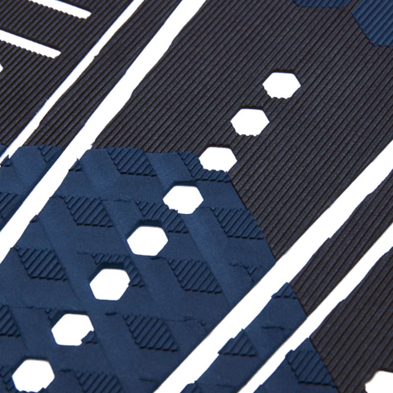 Shop Channel Islands 50/50 Flat Tail Pad - Black/Indigo Vertical Groove Close Up | Benny's Boardroom